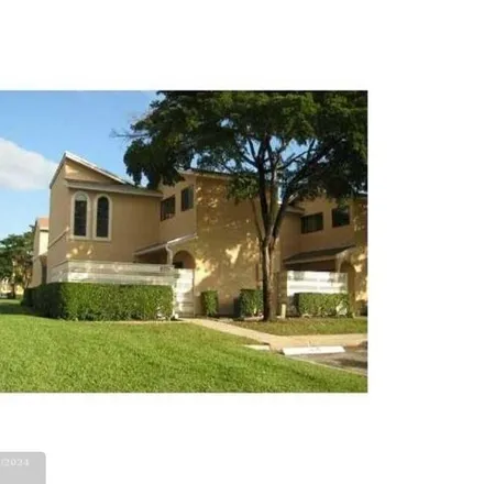 Buy this 3 bed house on 8000 Northwest 71st Court in Tamarac, FL 33321