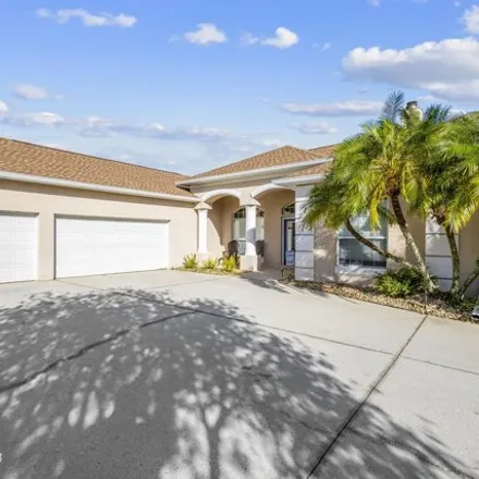 Buy this 4 bed house on 3907 Peacock Drive in Brevard County, FL 32904