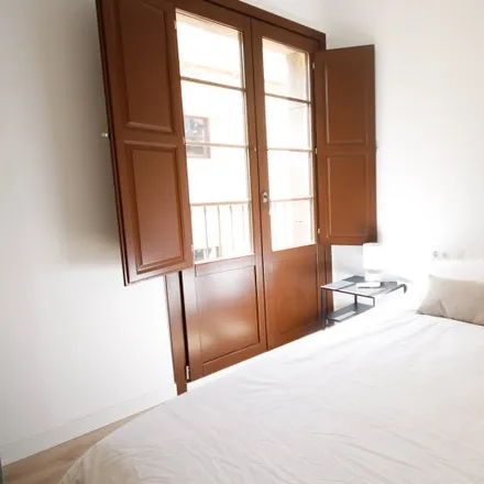 Rent this 6 bed room on Carrer de l'Om in 08001 Barcelona, Spain