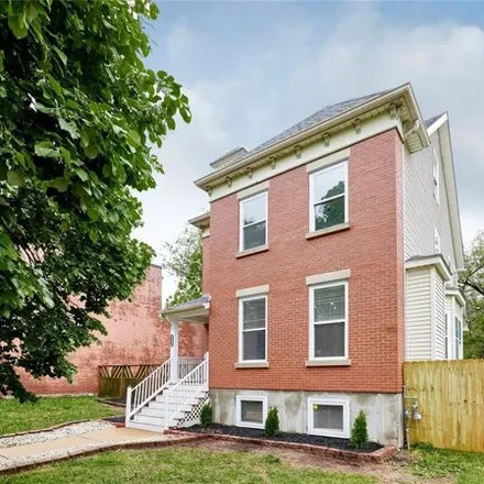 Buy this 4 bed house on 2644 Saint Vincent Avenue in St. Louis, MO 63104