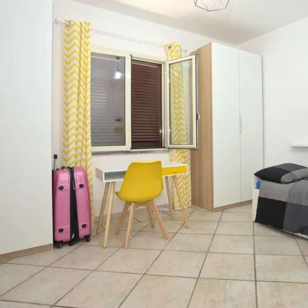 Rent this 8 bed room on Via Carlentini in 00132 Rome RM, Italy