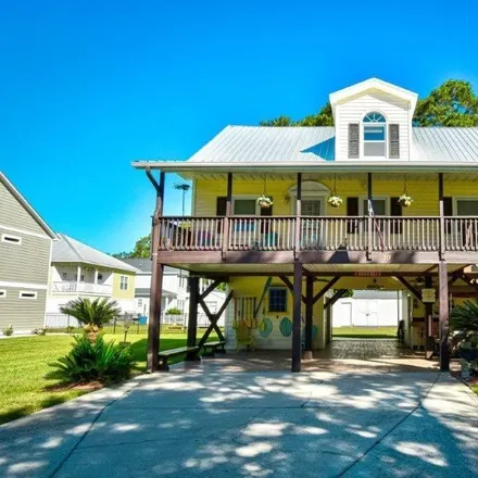 Buy this 4 bed house on 445 Elizabeth Drive in Garden City Beach, Horry County
