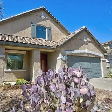 Rent this 4 bed house on West Thornbush Place in Oro Valley, AZ