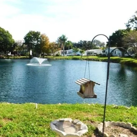 Buy this studio apartment on Saint Thomas Way in Largo, FL 34641