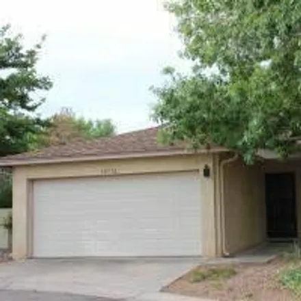 Rent this 3 bed house on Pennyback Park Drive Northeast in Albuquerque, NM