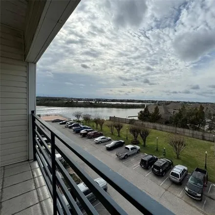 Rent this 2 bed condo on Peninsula Drive in League City, TX 77574