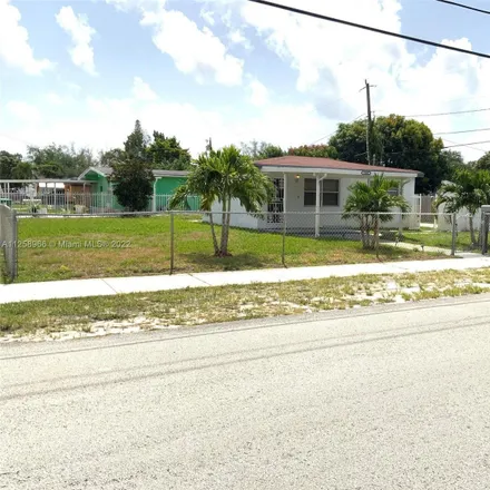 Buy this 2 bed house on 8355 Northwest 21st Avenue in Tradewinds Trailer Park, Miami-Dade County