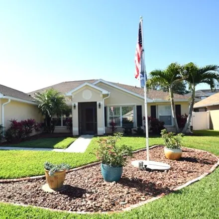 Buy this 4 bed house on 1508 Whitman Drive in West Melbourne, FL 32904