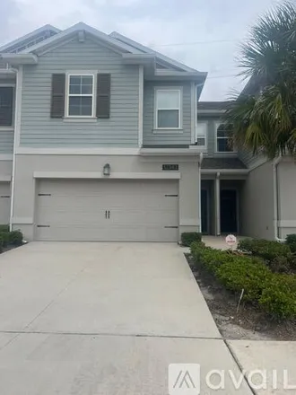 Rent this 4 bed house on 12343 Turtle Grass Dr