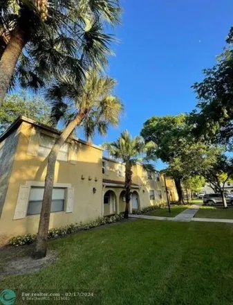 Buy this 3 bed townhouse on La Pacida Drive in Coral Springs, FL 33065