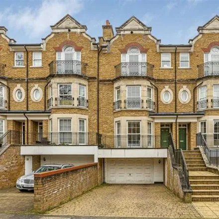 Buy this 6 bed townhouse on Inner Park Road in London, SW19 6DE