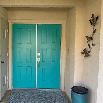 Rent this 2 bed condo on 82328 Cochran Drive in Indio, CA 92201
