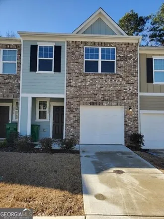 Rent this 3 bed house on 3009 Tarian Way in Panthersville, GA 30034
