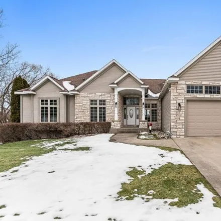 Buy this 4 bed house on 732 Bridgeview Bay Lane in Norton Shores, MI 49441