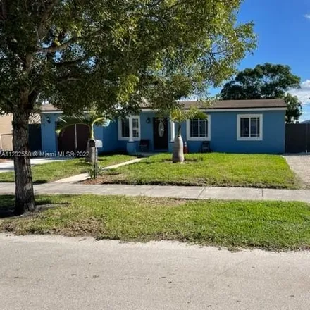 Rent this 4 bed house on U-Haul in Northwest 27th Avenue, Carol City
