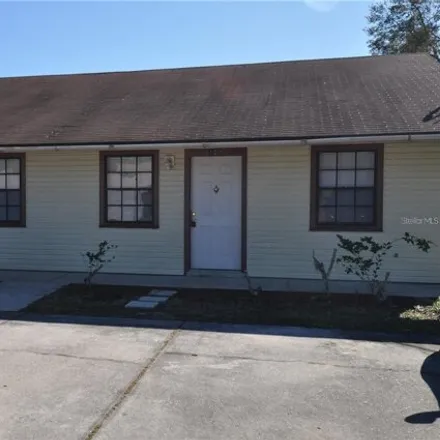 Rent this 2 bed house on 126 Denton Avenue in Auburndale, FL 33823