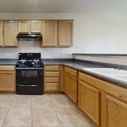 Buy this 3 bed apartment on 7231 Via Contenta Northeast in Northeast Albuquerque, Albuquerque
