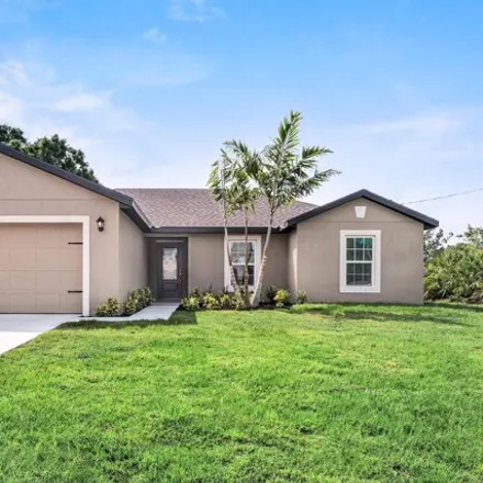 Buy this 3 bed house on 1194 Polk Street Northwest in Palm Bay, FL 32907