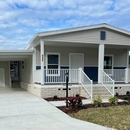 Buy this studio apartment on 645 Hogan Drive in Lady Lake, FL 32158