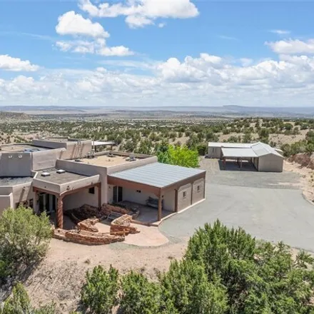 Buy this 5 bed house on 76 Del Charro Road in Santa Fe County, NM 87540