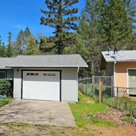 Buy this 3 bed house on 237 Shadowbrook Dr in Cave Junction, Oregon
