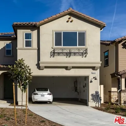 Rent this 3 bed house on Orange Blossom Drive in Santa Clarita, CA 91322