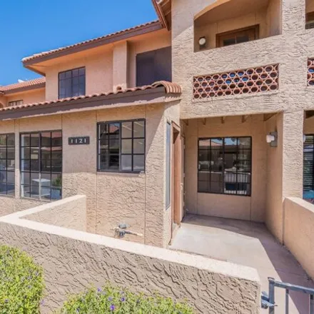 Buy this 2 bed house on 8554 East Belleview Place in Scottsdale, AZ 85257