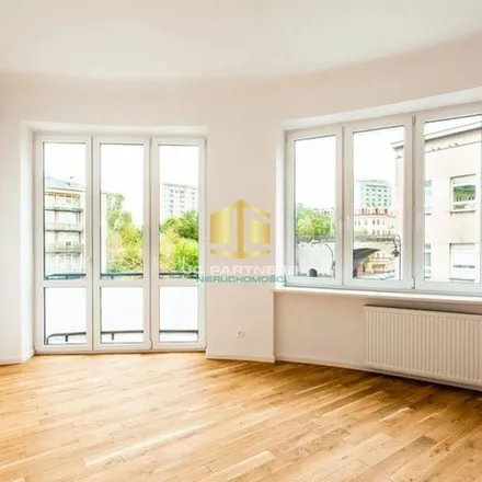 Rent this 6 bed apartment on Czerwonego Krzyża 2 in 00-377 Warsaw, Poland