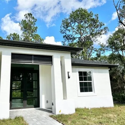 Buy this 4 bed house on 2400 Mabry Street in Lehigh Acres, FL 33920