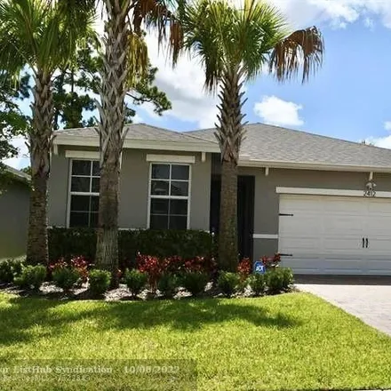 Rent this 4 bed house on 499 Foresta Terrace in West Palm Beach Farms, Palm Beach County