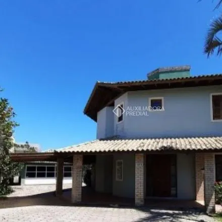 Rent this 4 bed house on Rua da Coruja in Campeche, Florianópolis - SC