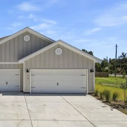 Rent this 4 bed house on 416 Eagle Lake Way in Panama City, Florida