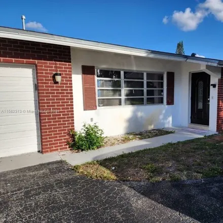 Buy this 2 bed house on 1719 Northwest 109th Avenue in Pembroke Pines, FL 33026