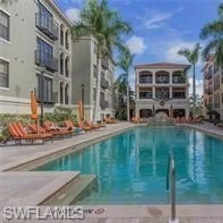 Rent this 2 bed condo on Coconut Point in 23159 Amgci Way, Shadow Wood