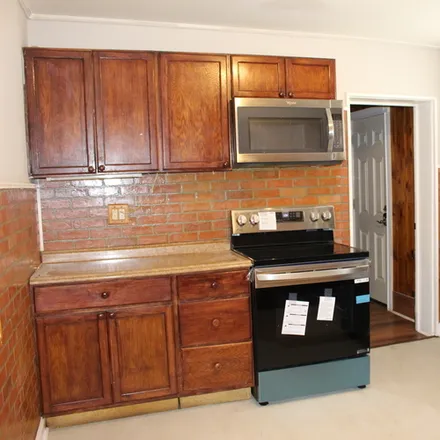 Rent this 4 bed house on 635 Astor Street