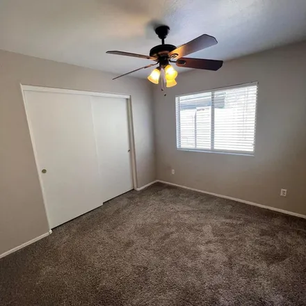 Rent this 4 bed apartment on 1938 South 159th Avenue in Goodyear, AZ 85338