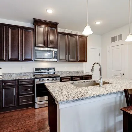 Rent this 3 bed townhouse on 2320 Field Point Road in McNair, Fairfax County