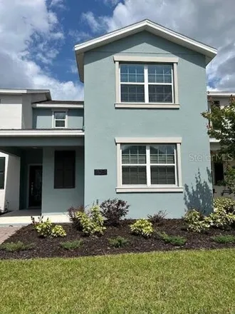 Rent this 4 bed house on Listening Drive in Orange County, FL 32832