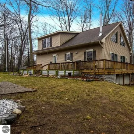 Buy this 4 bed house on 7670 Duck Lake Alley in Green Lake Township, Grand Traverse County