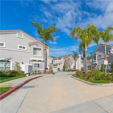Buy this 3 bed townhouse on 7316 Bret Ct in Huntington Beach, California