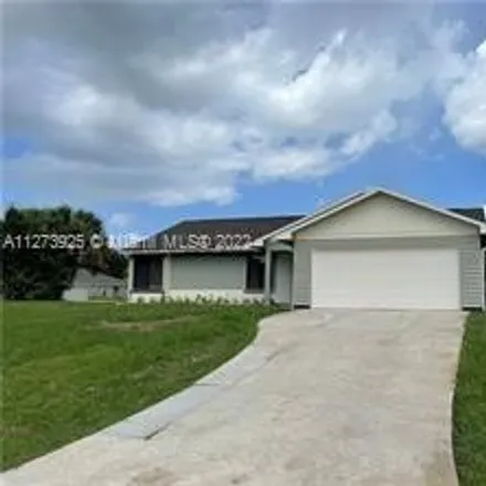 Rent this 3 bed house on 4057 Southwest Haycroft Street in Port Saint Lucie, FL 34953