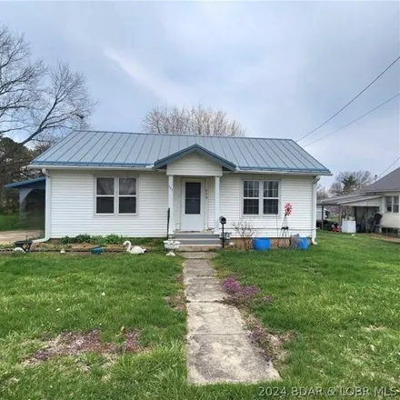 Buy this 4 bed house on 458 West Cleveland Street in Versailles, Morgan County