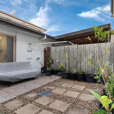 Rent this 3 bed townhouse on Seashell Avenue in Coomera QLD 4209, Australia