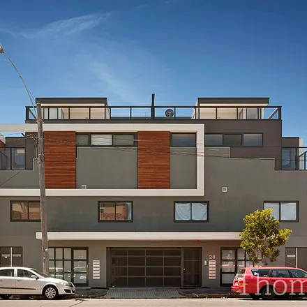 Rent this 2 bed townhouse on 28 Ireland Street in West Melbourne VIC 3003, Australia