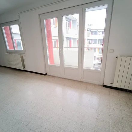 Rent this 4 bed apartment on 1 Place des Arènes in 30000 Nîmes, France