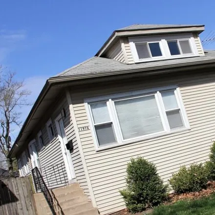 Buy this 3 bed house on 11926 South Princeton Avenue in Chicago, IL 60628