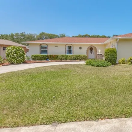 Buy this 3 bed house on 1976 Player Circle North in Melbourne, FL 32935