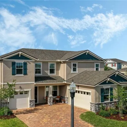 Buy this 4 bed house on 2427 Woodward Hill Court in Clermont, FL 34740