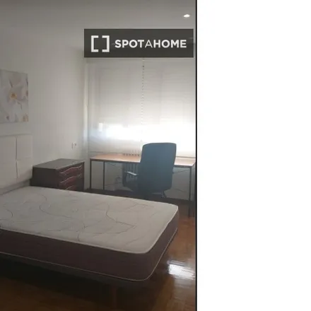Rent this 3 bed room on Calle de Ayacucho in 2, 4