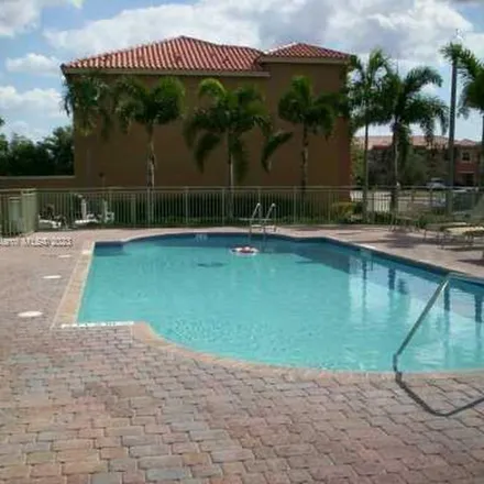 Rent this 3 bed apartment on 10683-10697 Southwest 6th Street in Pembroke Pines, FL 33025